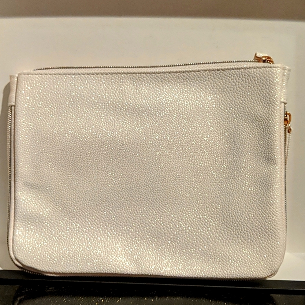 NWOT Shiseido Ivory Shimmer Makeup Bag.